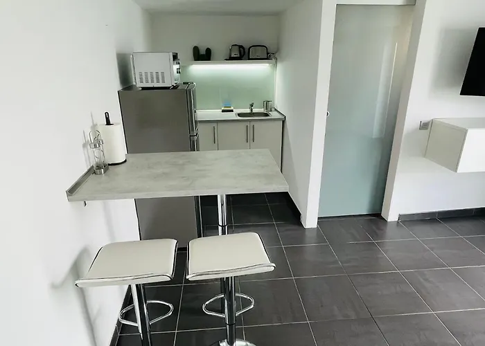 Estudio Grey By Vulcano Homes Таиче